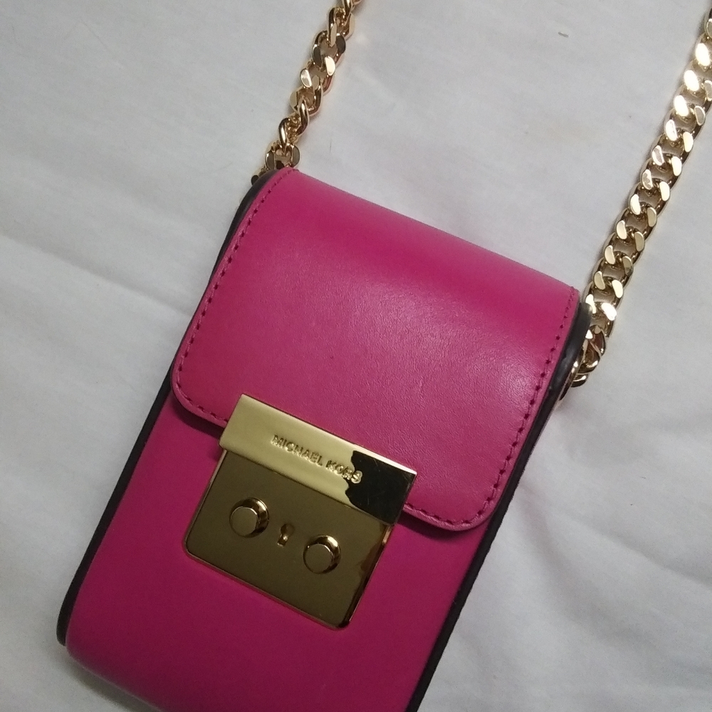 Michael Kors raspberry colored purse